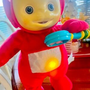 Rare Teletubbies Interactive Plush Red Po Doll sings lights up and dances.